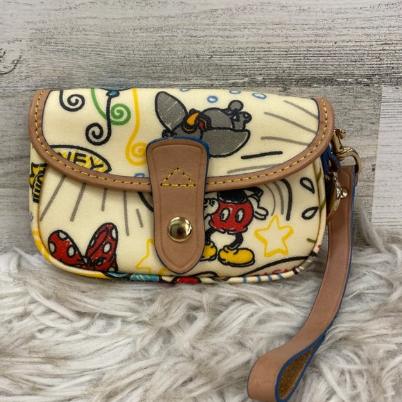 Extremely RARE Dooney and Bourke Disney resorts wristlet! Dumbo and Minnie!